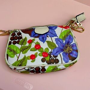 A faux leather makeup bag